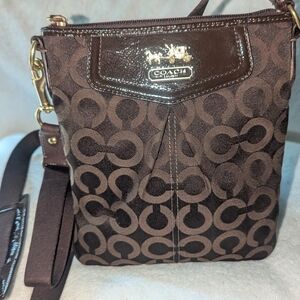 Coach Madison Slim SwBrown Swingpack Op Art Pattern and Leather Trim.